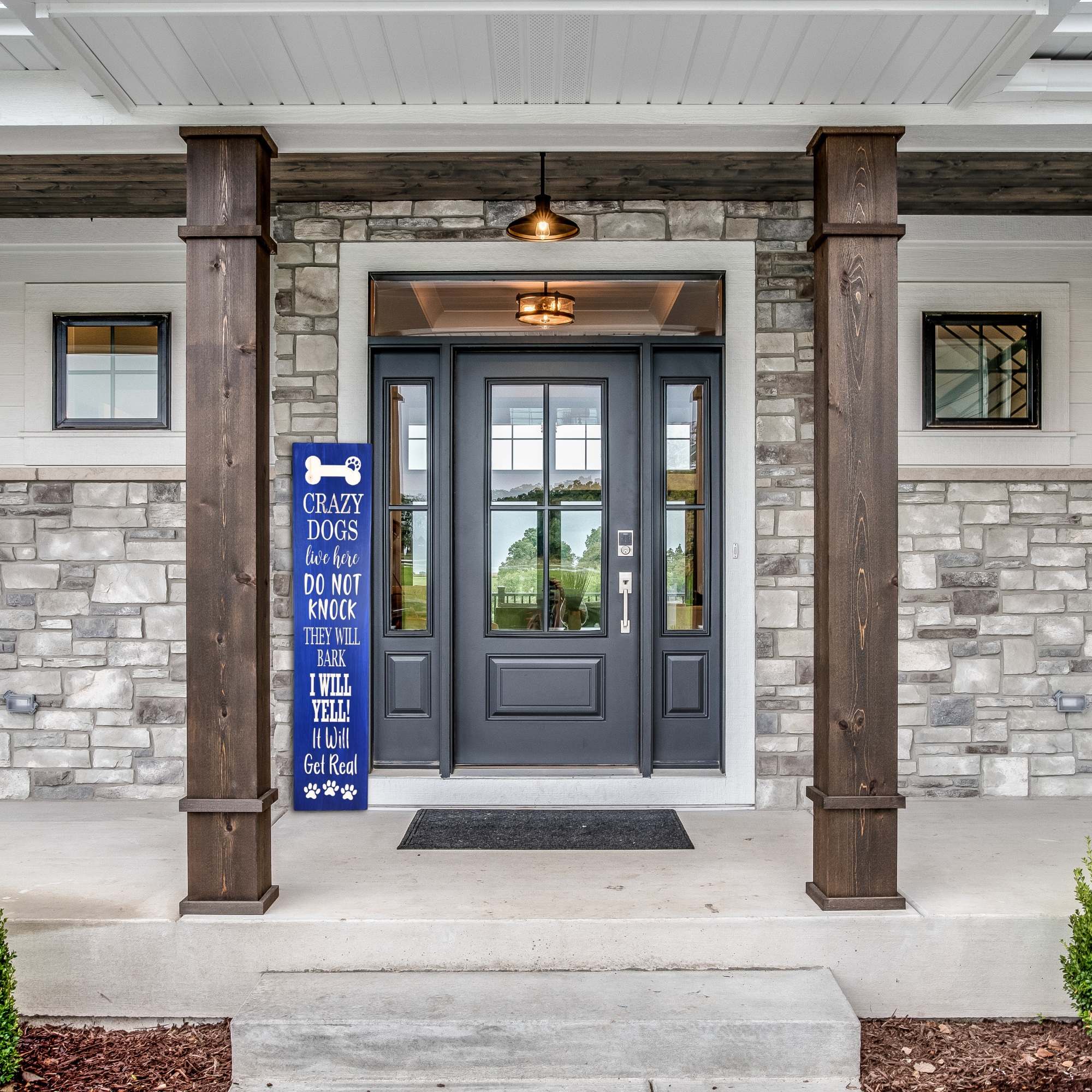 Front Porch Crazy Dogs Live Here Sign - Dog Decor - Customized carved wooden sign for home decor or gift.